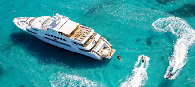 yacht and people in clear water