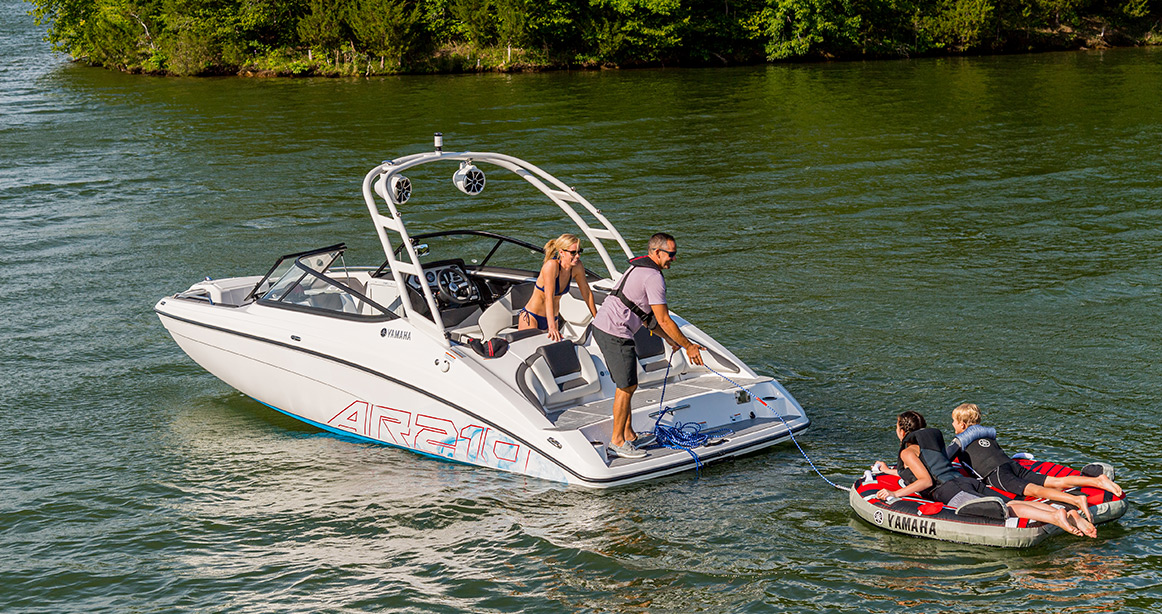 Yamaha boat out on the water with a family onboard