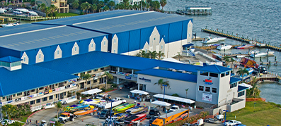 View of MarineMax Houston Marina with water in the background