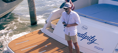 a Yacht Controller technician on back of a yacht