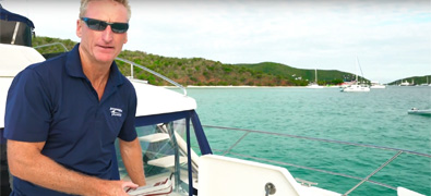 Man on board of a boat - Boating Tip Video for Anchoring with a Windlass