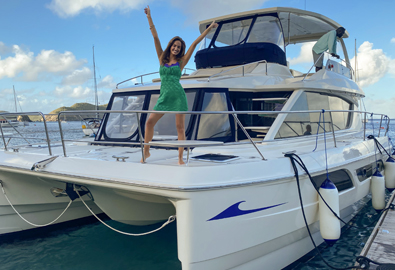 a sports illustrated swimsuit model aboard a marinemax vacations power catamaran